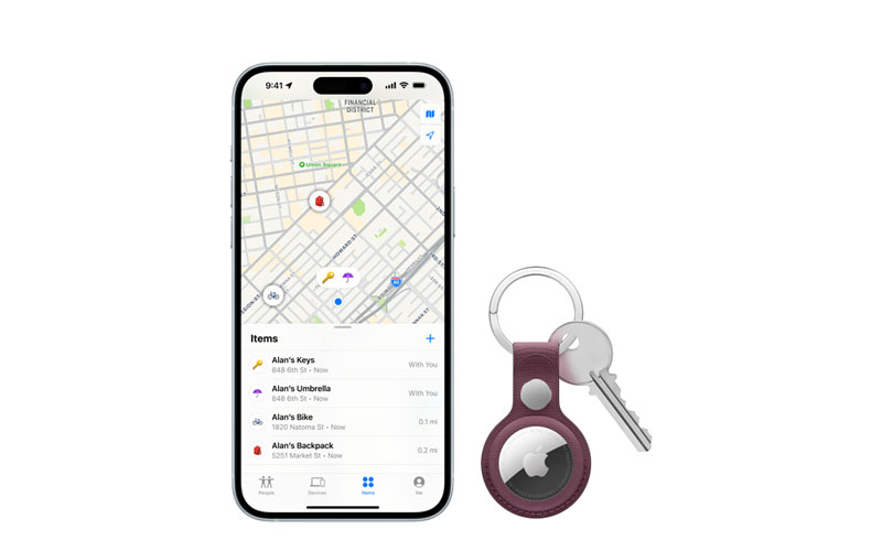 AirTag in a keychain with iPhone 15 Plus